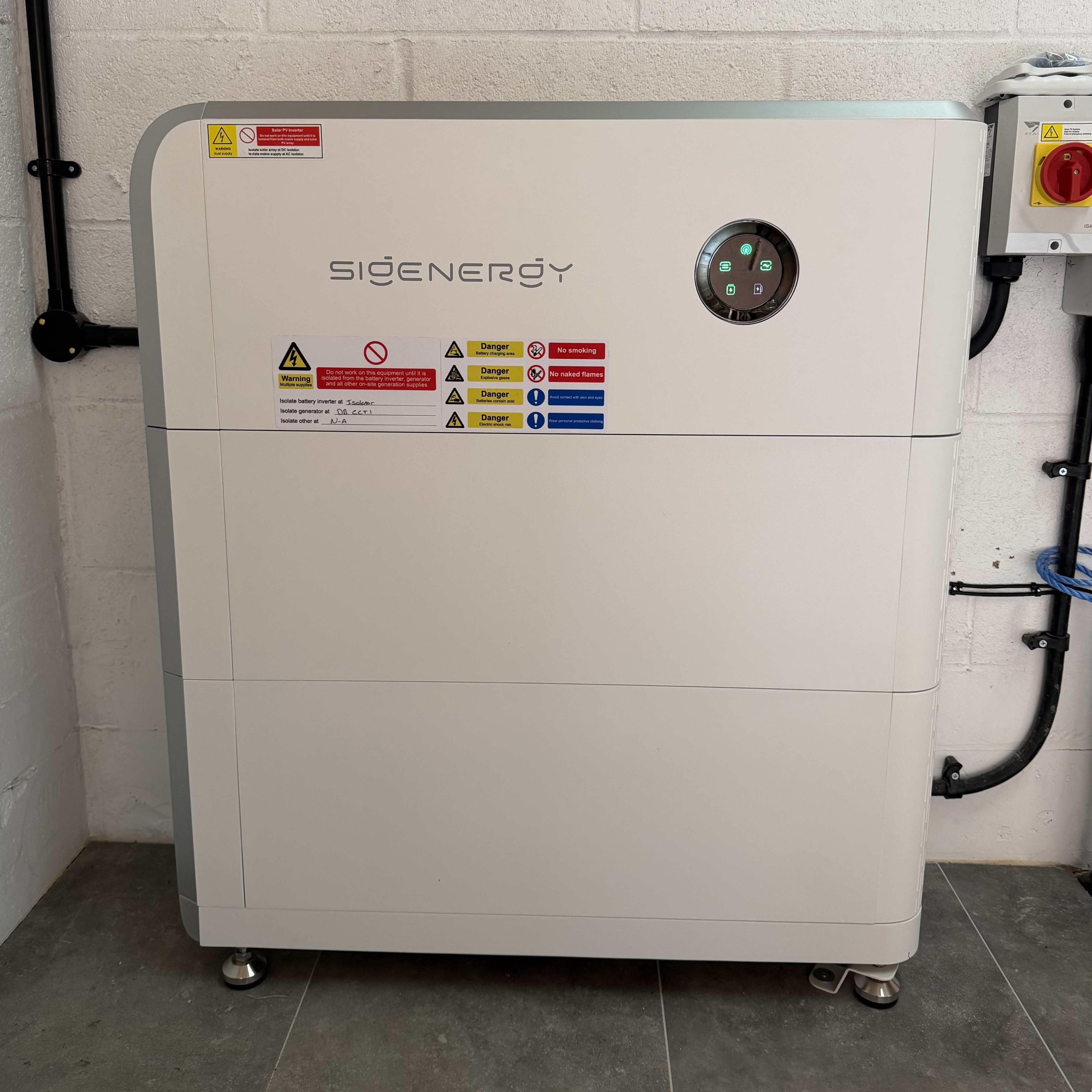 A home battery storage unit mounted on a wall